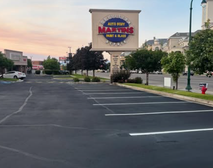 Multi-tenant shopping center sealcoat and re-stripe