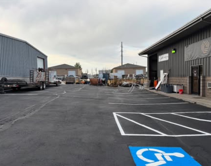 Freshly painted ADA-compliant handicap parking stall striping